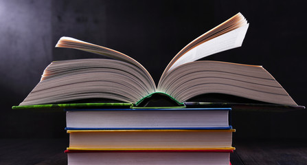 Composition with open book on the table