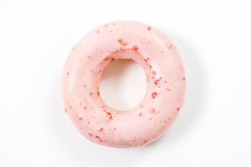 Strawberry donut on a white background.