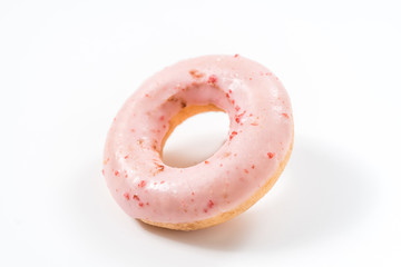 Strawberry donut on a white background.