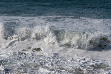 Foamy Atlantic ocean water, Portugal coast.