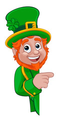 A Leprechaun St Patricks Day Irish cartoon character peeking around a sign or banner and pointing 