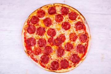 Salami tomato sauce pizza, salami and oregano