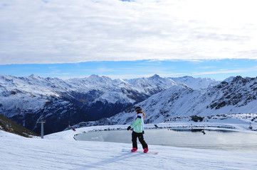 Fototapeta na wymiar The snow farming lake on Parsenn mountain above Davos City