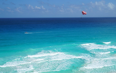 sea parasailing above the blue Caribbean sea