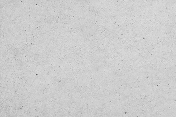 Texture of thick, white paper made from recycled materials