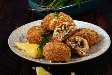 Still life. Baked meat patties in breading.