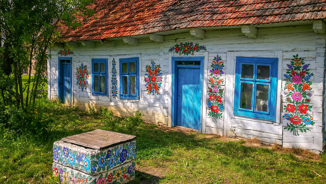 Wall of a traditional colorful building in Zalipie village in Poland.