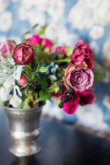 bouquet in silver vase