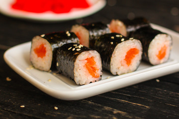 rolls and sushi set mix different tastes. food background. top