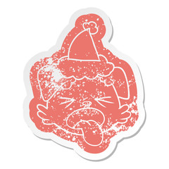cartoon distressed sticker of a dog face wearing santa hat