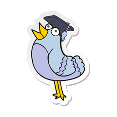 sticker of a cartoon bird wearing graduation cap
