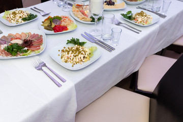 Festive table with bright snacks