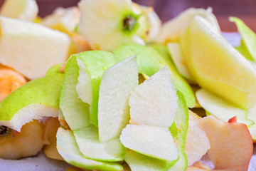 Peelings green apple, pieces of peel close-up