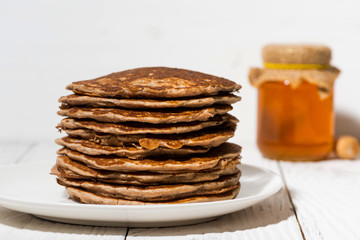 a stack of homemade pancakes, closeup