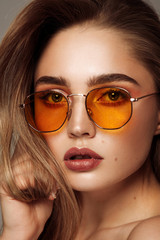 Close up face of young girl wear sunglasses