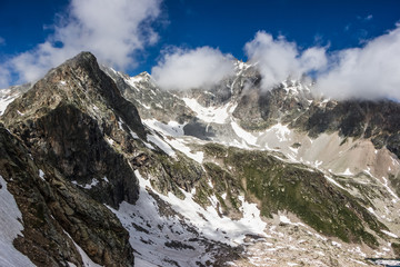 high mountains covered with snow and ice, peaks and valleys in the Caucasus