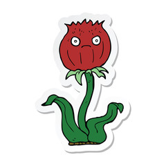 sticker of a cartoon thistle