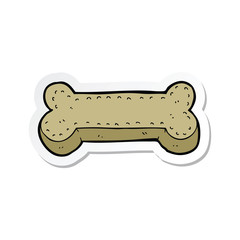 sticker of a cartoon dog biscuit