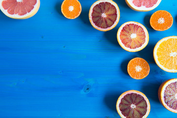 Orange, Blood orange, grapefruit and tangerines, fruit on the blue wooden table