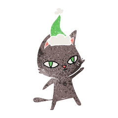 retro cartoon of a cat staring wearing santa hat