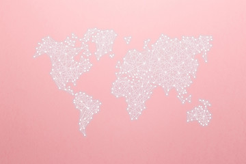 World map on the principle of neural networks on the pink background. World community and network. Artificial intelligence, machine and deep learning, neural networks. Minimal creative idea