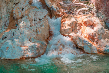 Fototapeta na wymiar Natural thermal waterfall