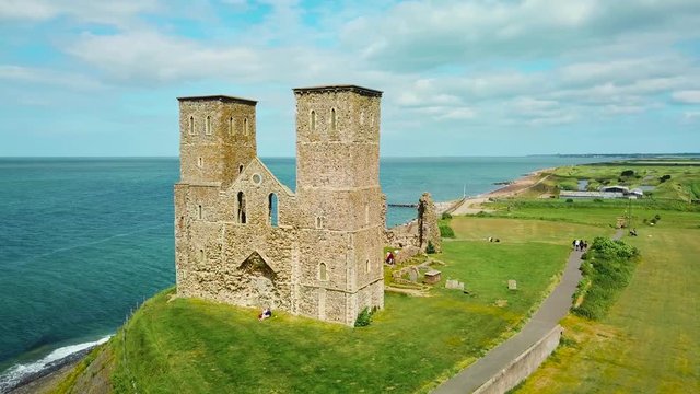 A beautiful drone aerial over the Reculver Towers, an abandoned abbey in Kent, England.
