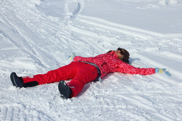 Young woman relax in snow Igloo. Winter vacation. Winter and new year holidays concept. 