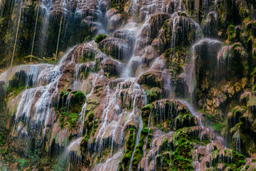 Waterfall outside a grotto