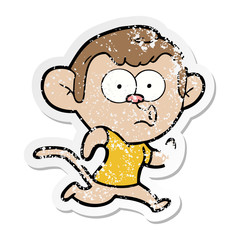 distressed sticker of a cartoon hooting monkey