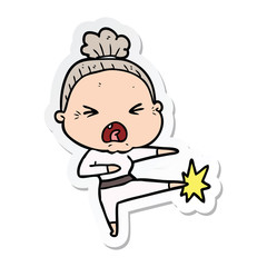sticker of a cartoon angry old woman