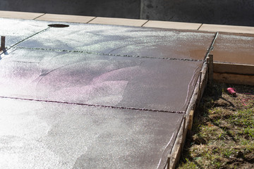 Freshly Poured Deck Cement Curing In Wood Frame