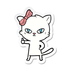 sticker of a cute cartoon cat giving thumbs up symbol