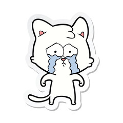 sticker of a cartoon crying cat