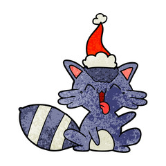 cute textured cartoon of a raccoon wearing santa hat