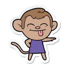 sticker of a funny cartoon monkey pointing