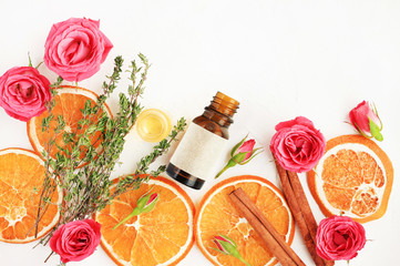  Essential oil blend with orange fruit dried slices, fresh rose blossom, thyme herb. Dropper bottle...
