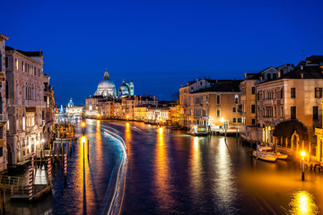 Night shot of Grand Canal and Basilica Santa Maria della Salute, Venice, Italy.