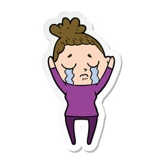 sticker of a cartoon crying woman