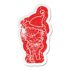 cartoon distressed sticker of a girl wearing futuristic clothes wearing santa hat