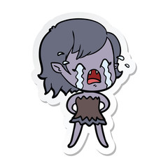 sticker of a cartoon crying vampire girl