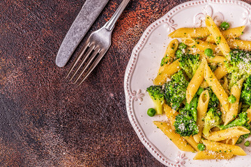 Pasta with broccoli, green peas, garlic, cheese.