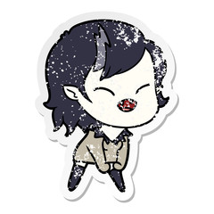 distressed sticker of a cartoon laughing vampire girl