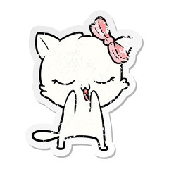 distressed sticker of a cartoon cat with bow on head