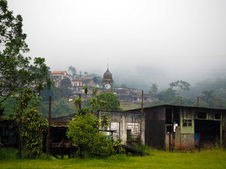 Fototapeta na wymiar Misty old building in foggy tropical jungle in Sao Paulo, Brasil