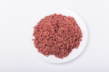 Top view of raw minced beef meat isolated on white