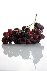 Wet red grape cluster isolated