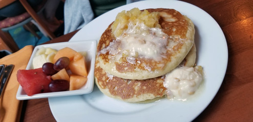Pineapple Macadamia Nut Pancakes and Fruit Salad Bowl for a Yummy Healthy Polynesian Style Breakfast from Hawaii