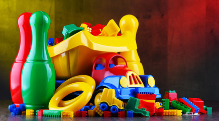 Composition with colorful plastic children toys