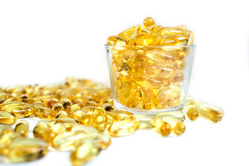 Fish oil capsules packed with omega 3 6 9 in a jar healthy lifestyle space for text